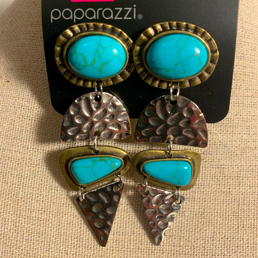 Silver and brass post earrings.